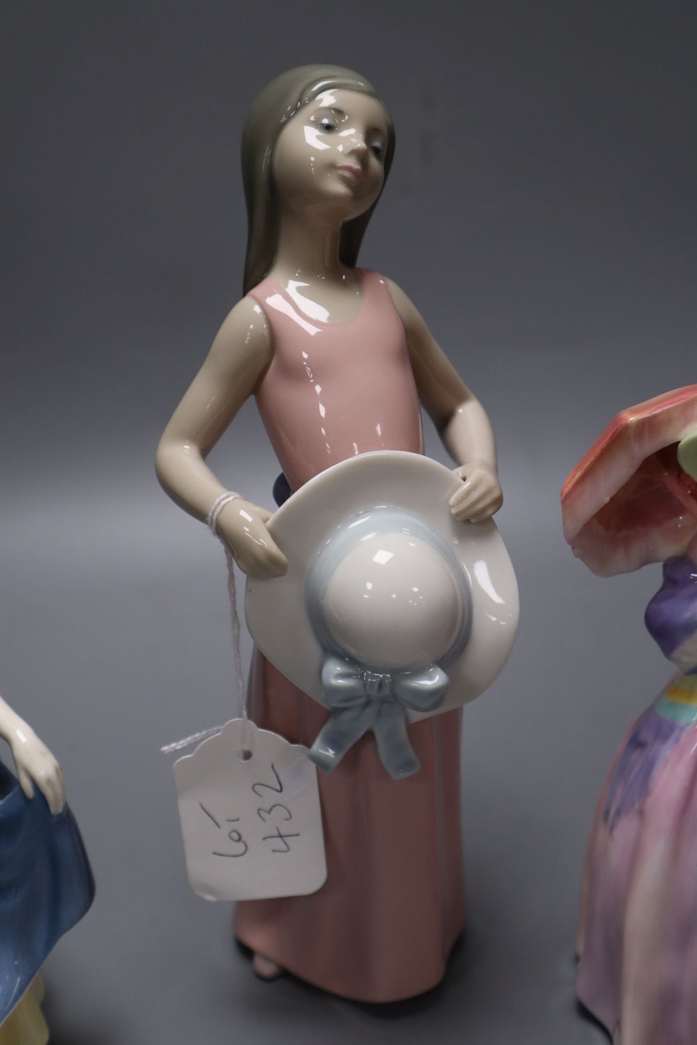 Two Royal Doulton figures and one Lladro figure (3)